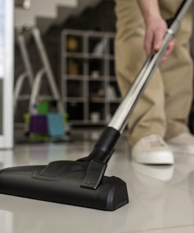 man doing professional home cleaning service